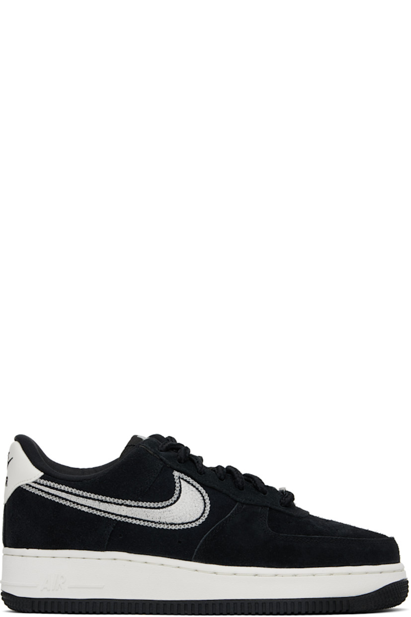 Low-top suede sneakers in black.

· Perforated detailing at toe
· Logo plaque at lace-up closure
· Logo patch at padded tongue
· Padded collar
· Swoosh embroidered at sides
· Logo embroidered at heel tab
· Jersey lining
· Treaded rubber sole

Please note that this item may be shipped only within North America.

Supplier color: Black/Sail