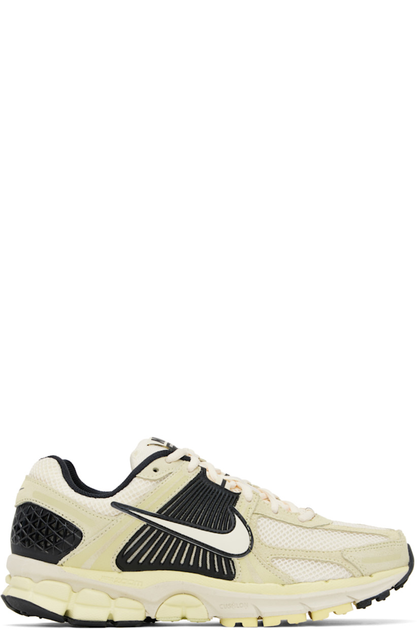 Low-top mesh, suede, and buffed faux-leather sneakers in off-white and black.

· Lace-up closure
· Logo patch at padded tongue
· Padded collar
· Rubberized overlay at sides and heel
· Swoosh appliqué at sides
· Swoosh printed at heel
· Mesh lining
· Zoom Air unit at foam rubber midsole
· Treaded rubber sole 

Please note that this item may be shipped only within North America.

Supplier color: Alabaster/Black/White/Pale ivory