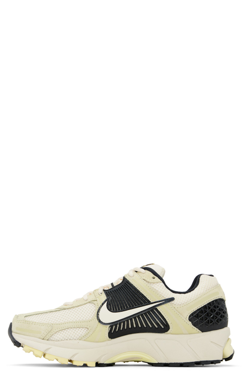 Low-top mesh, suede, and buffed faux-leather sneakers in off-white and black.

· Lace-up closure
· Logo patch at padded tongue
· Padded collar
· Rubberized overlay at sides and heel
· Swoosh appliqué at sides
· Swoosh printed at heel
· Mesh lining
· Zoom Air unit at foam rubber midsole
· Treaded rubber sole 

Please note that this item may be shipped only within North America.

Supplier color: Alabaster/Black/White/Pale ivory
