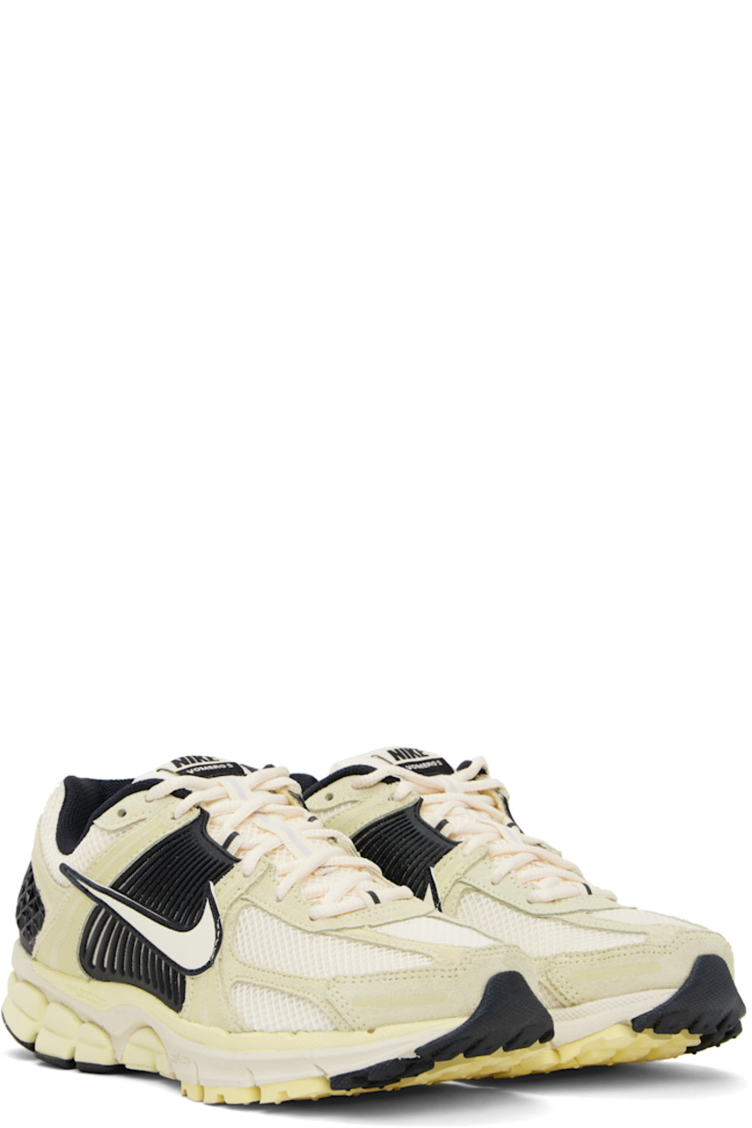 Low-top mesh, suede, and buffed faux-leather sneakers in off-white and black.

· Lace-up closure
· Logo patch at padded tongue
· Padded collar
· Rubberized overlay at sides and heel
· Swoosh appliqué at sides
· Swoosh printed at heel
· Mesh lining
· Zoom Air unit at foam rubber midsole
· Treaded rubber sole 

Please note that this item may be shipped only within North America.

Supplier color: Alabaster/Black/White/Pale ivory