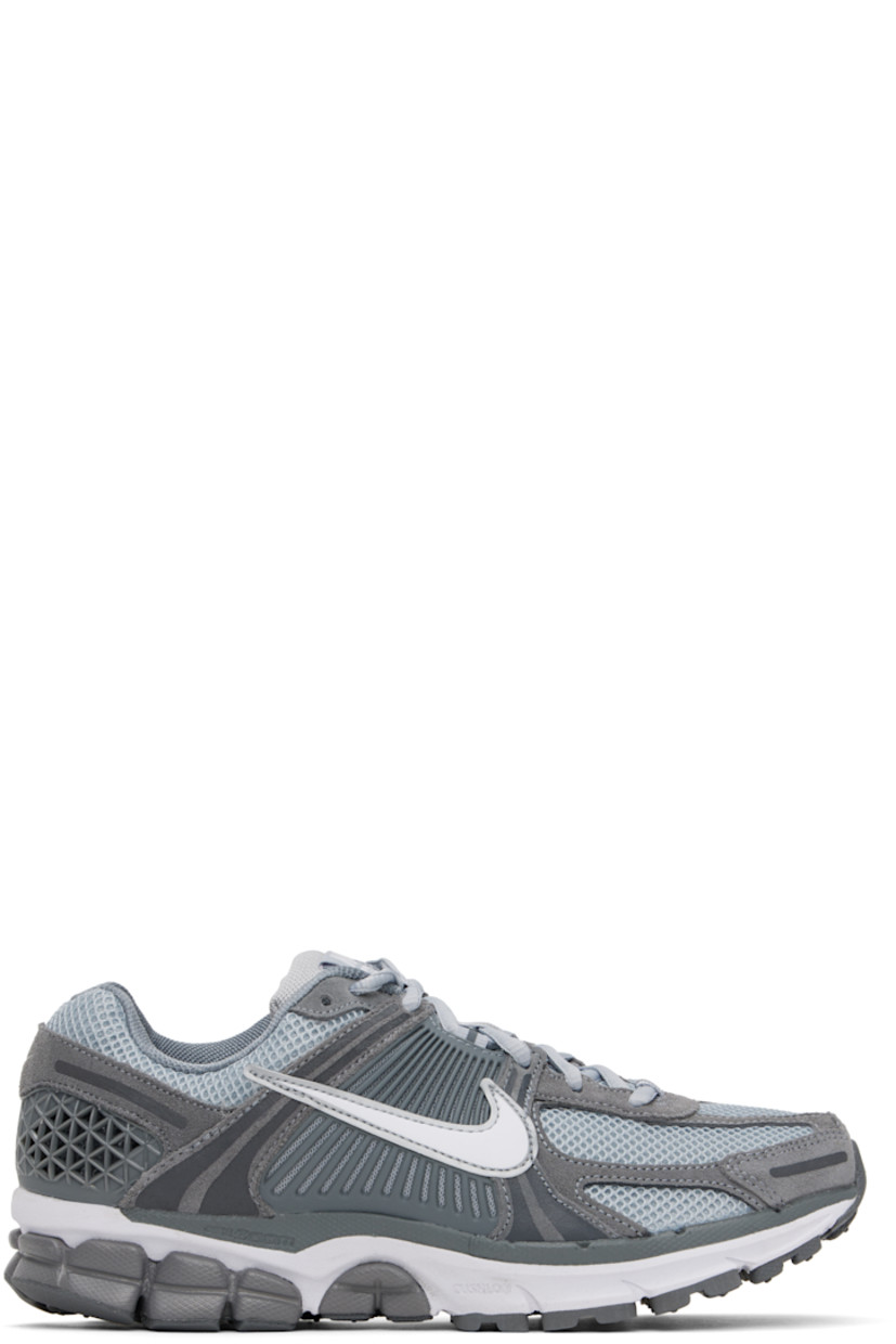 Low-top mesh, suede, and buffed faux-leather sneakers in gray.

· Reflective trim throughout
· Lace-up closure
· Logo patch at padded tongue
· Padded collar
· Rubberized overlay at sides and heel
· Swoosh appliqué at sides
· Swoosh printed at heel
· Mesh lining
· Zoom Air unit at foam rubber midsole
· Treaded rubber sole 

Please note that this item may be shipped only within North America.

Supplier color: Cool Grey/Wolf Grey/White