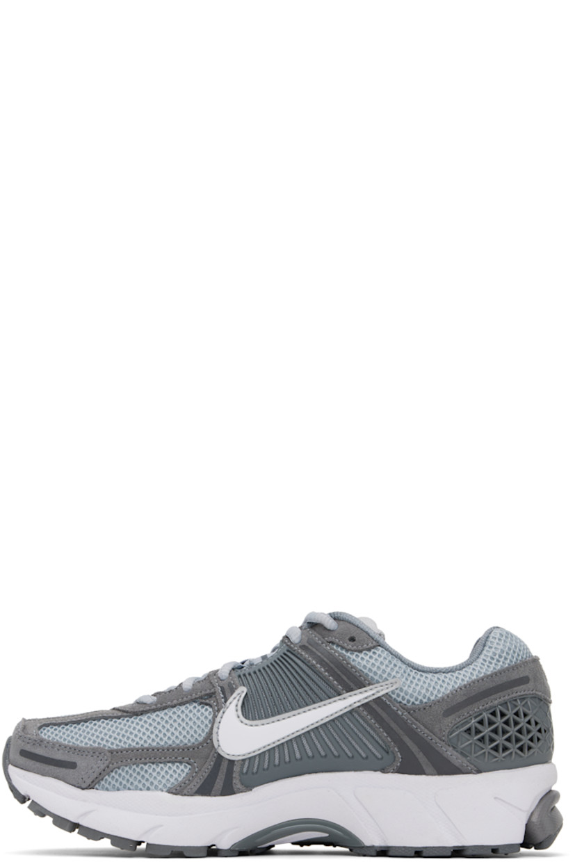 Low-top mesh, suede, and buffed faux-leather sneakers in gray.

· Reflective trim throughout
· Lace-up closure
· Logo patch at padded tongue
· Padded collar
· Rubberized overlay at sides and heel
· Swoosh appliqué at sides
· Swoosh printed at heel
· Mesh lining
· Zoom Air unit at foam rubber midsole
· Treaded rubber sole 

Please note that this item may be shipped only within North America.

Supplier color: Cool Grey/Wolf Grey/White