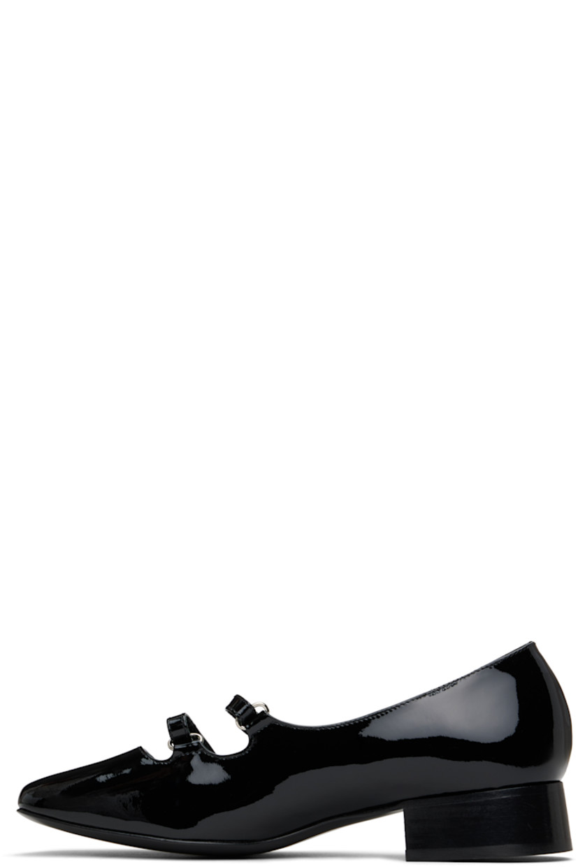 Handcrafted patent leather Mary Jane-style ballerina flats in black.

· Square toe
· Velcro straps at vamp
· Buffed leather and suede lining
· Stacked block heel with rubber injection
· Leather sole
· Heel: H1.25"

Supplier color: Black