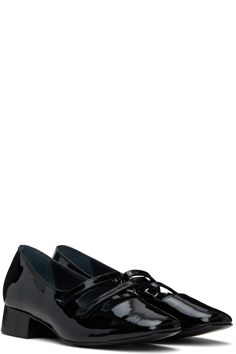 Handcrafted patent leather Mary Jane-style ballerina flats in black.

· Square toe
· Velcro straps at vamp
· Buffed leather and suede lining
· Stacked block heel with rubber injection
· Leather sole
· Heel: H1.25"

Supplier color: Black