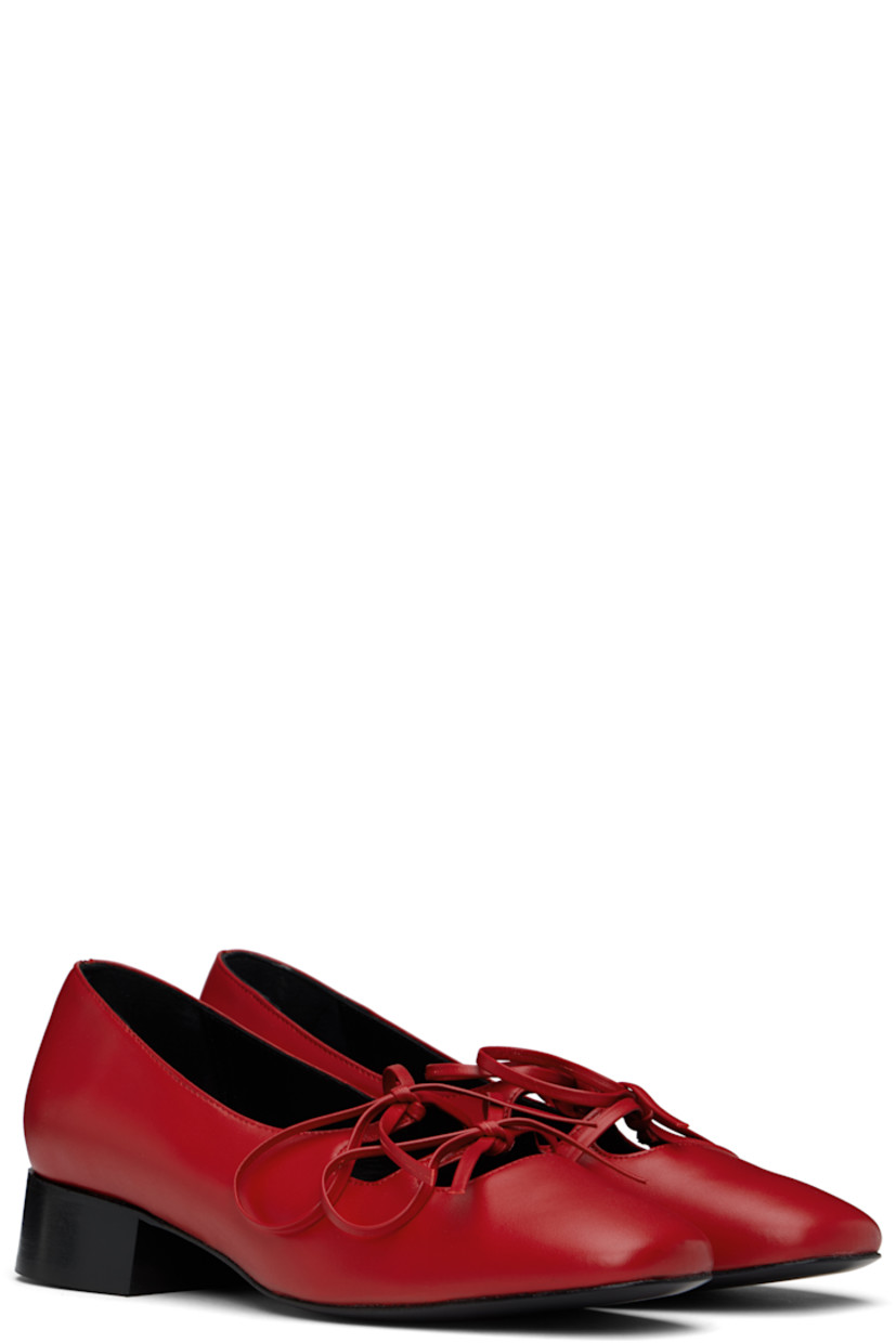 Handcrafted buffed nappa leather Mary Jane-style ballerina flats in red.

· Square toe
· Self-tie bow accents at vamp
· Logo embossed at padded footbed
· Buffed leather and suede lining
· Stacked leather heel with rubber injection
· Polished leather sole
· Heel: H1.25"

Supplier color: Red