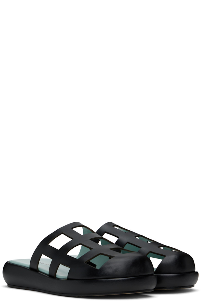 Buffed leather slippers in black.

· Cutouts throughout
· Logo printed at padded footbed
· Covered midsole 
· Suede sole

Supplier color: Black