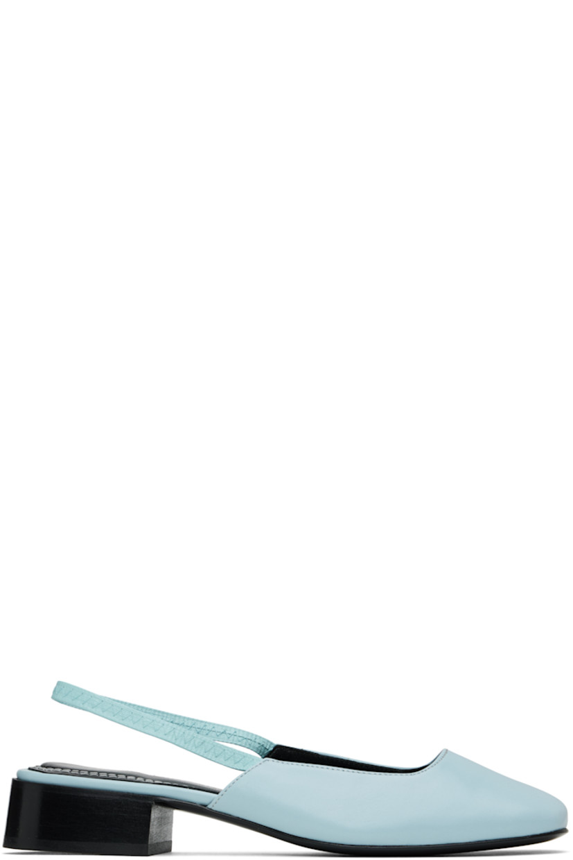 Buffed leather heels in blue.

· Square toe
· Elasticized slingback strap
· Logo printed at padded footbed
· Buffed leather lining
· Stacked leather heel with rubber injection
· Polished leather sole
· Heel: H1.25"

Supplier color: Blue