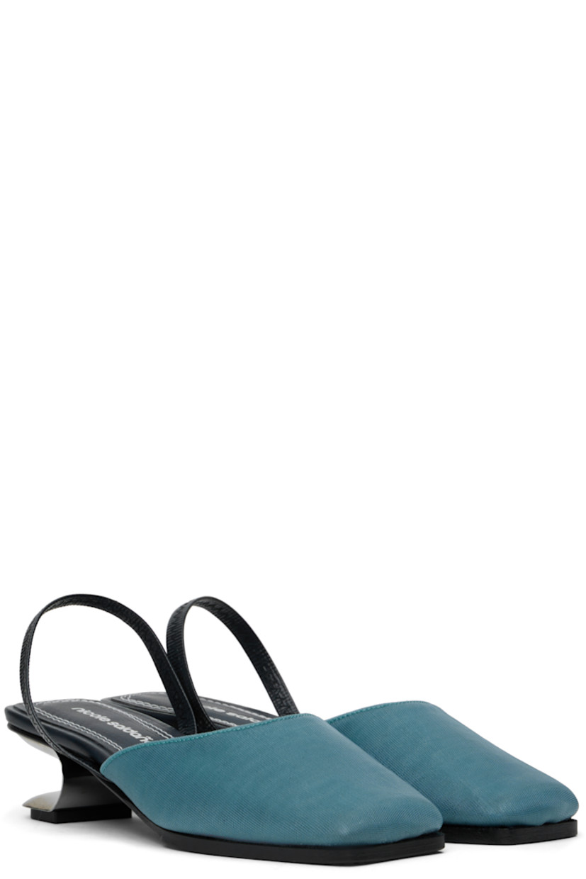 Handcrafted mesh heels in blue.

· Square toe
· Elasticized slingback strap
· Logo stamp at padded leather footbed
· Grained leather lining
· Sculptural metal kitten heel with rubber injection
· Polished leather sole
· Heel: H1.75"

Supplier color: Blue