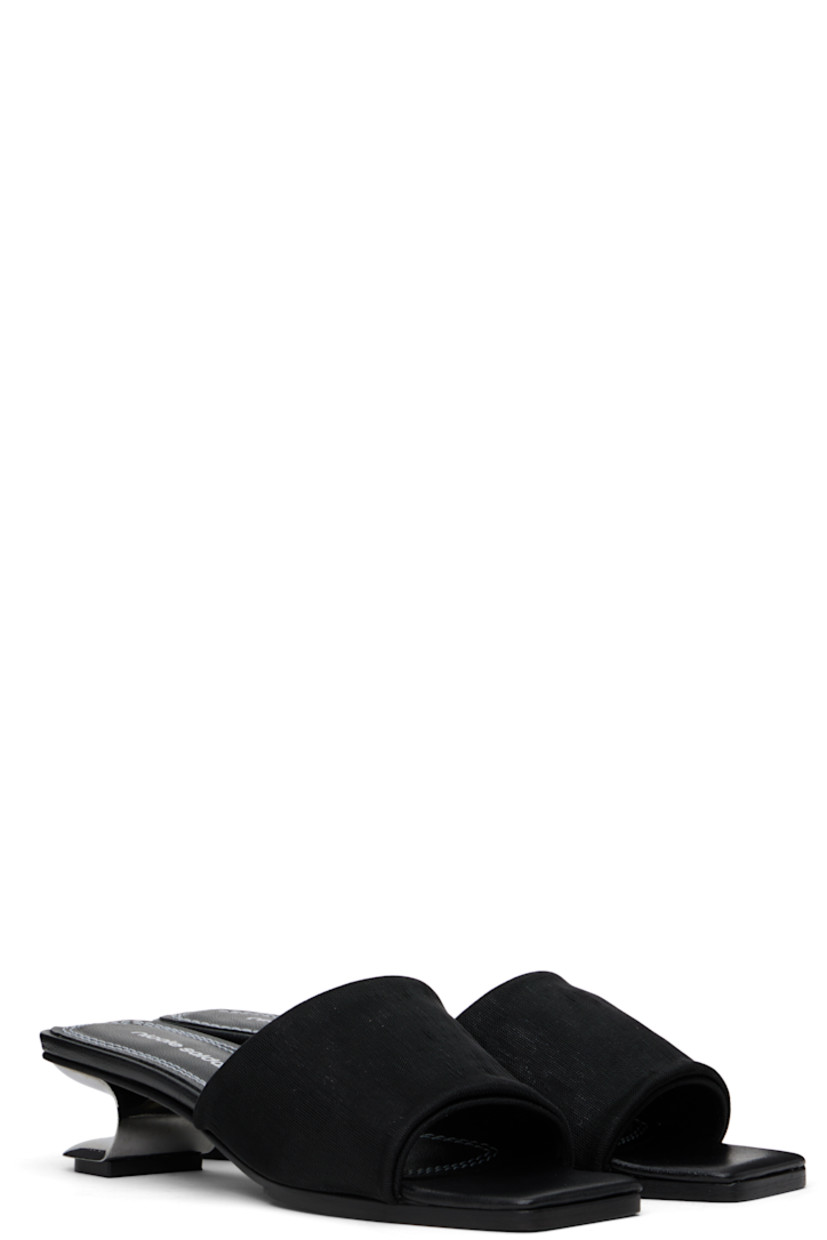 Handcrafted mesh heeled sandals in black. 

· Open square toe
· Logo printed at padded leather footbed
· Sculptural metal kitten heel with rubber injection
· Polished leather sole
· Heel: H1.5"

Supplier color: Black