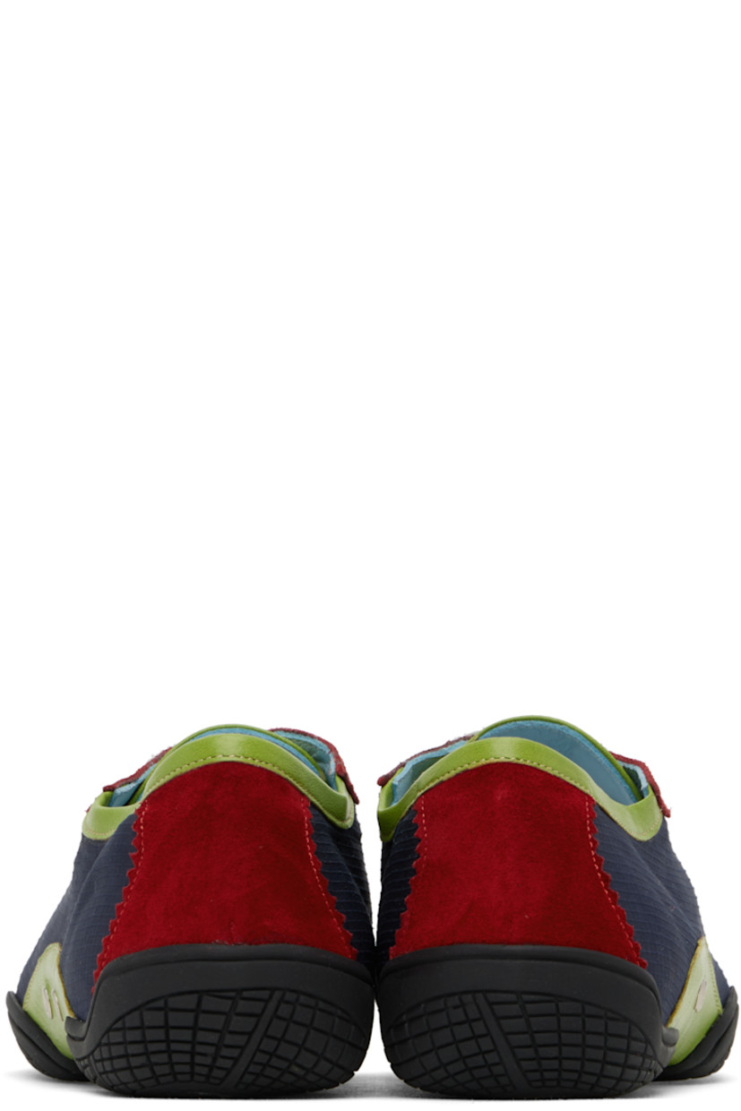 Handcrafted low-top ripstop and suede sneakers in navy and red.

· Serrated edges throughout
· Lace-up closure
· Buffed leather trim in green at collar and sides
· Eyelets at sides
· Grained leather lining
· Treaded rubber sole

Supplier color: Blue