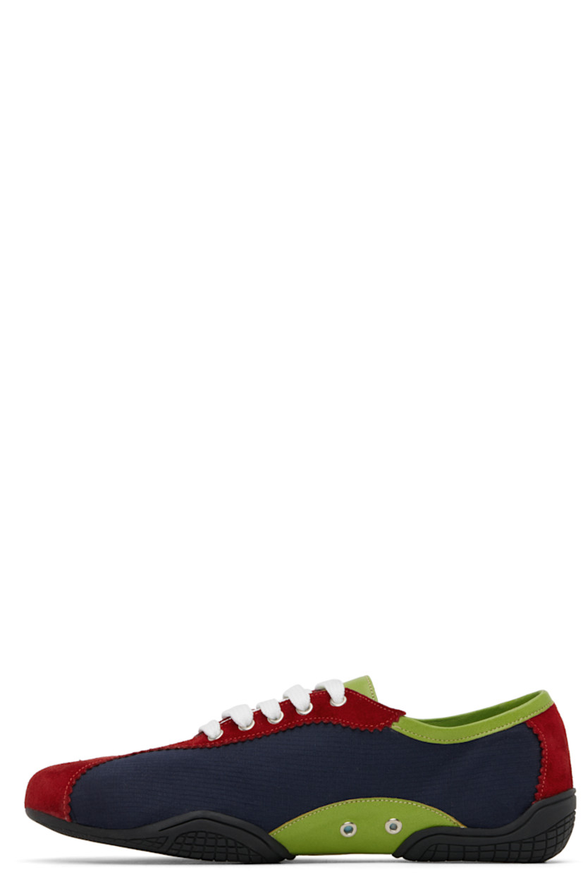 Handcrafted low-top ripstop and suede sneakers in navy and red.

· Serrated edges throughout
· Lace-up closure
· Buffed leather trim in green at collar and sides
· Eyelets at sides
· Grained leather lining
· Treaded rubber sole

Supplier color: Blue