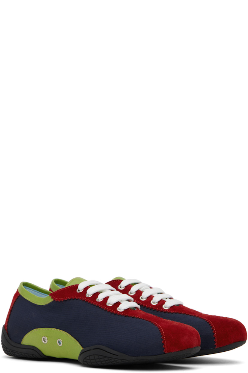Handcrafted low-top ripstop and suede sneakers in navy and red.

· Serrated edges throughout
· Lace-up closure
· Buffed leather trim in green at collar and sides
· Eyelets at sides
· Grained leather lining
· Treaded rubber sole

Supplier color: Blue