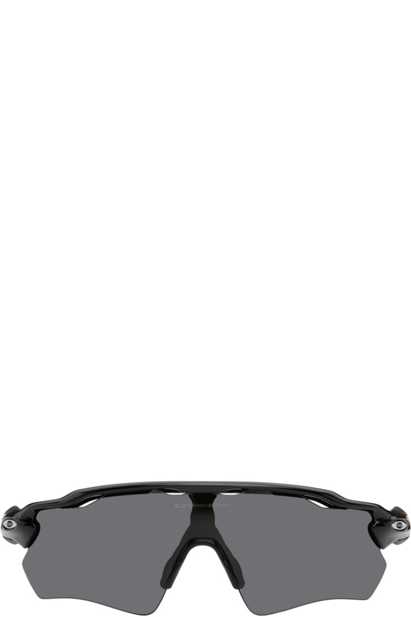 Shield-style semi-rimless O-Matter™ nylon-frame sunglasses in black.

· Gray Prizm™ lens with HDO® technology
· Logo and text etched at lens
· Detachable anti-slip Unobtainium® nose pads
· Logo hardware at temples
· Anti-slip Unobtainium® temple tips
· Includes case
· Size: 128

Supplier color: Black