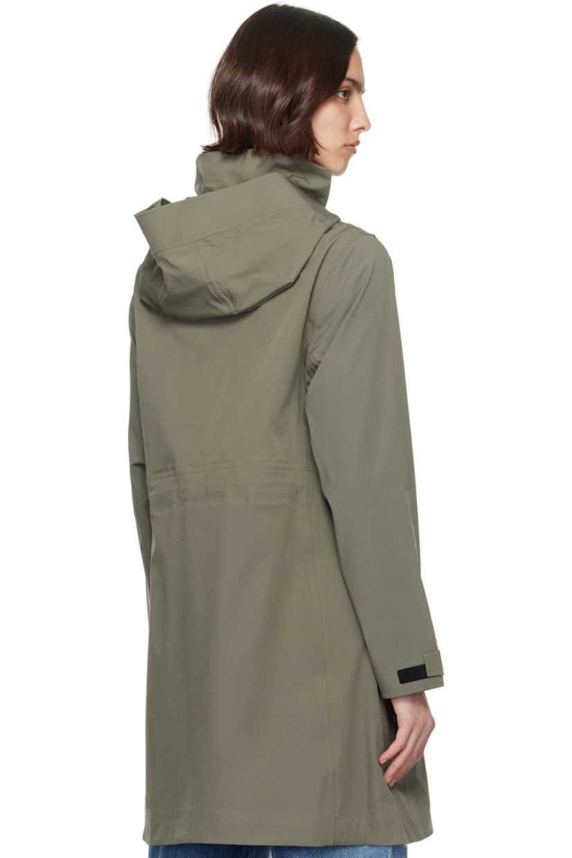 Waterproof stretch nylon taffeta raincoat.

· Bungee-style drawstring and reflective trim at hood
· Stand collar
· Two-way zip closure with press-stud placket
· Flap pockets
· Rubberized logo patch at sleeve
· Velcro tab at cuffs
· Taped seams at interior
· Bungee-style drawstring at interior waist
· Full bonded jersey lining

Part of the Black Label collection.

Supplier color: Smokey sage