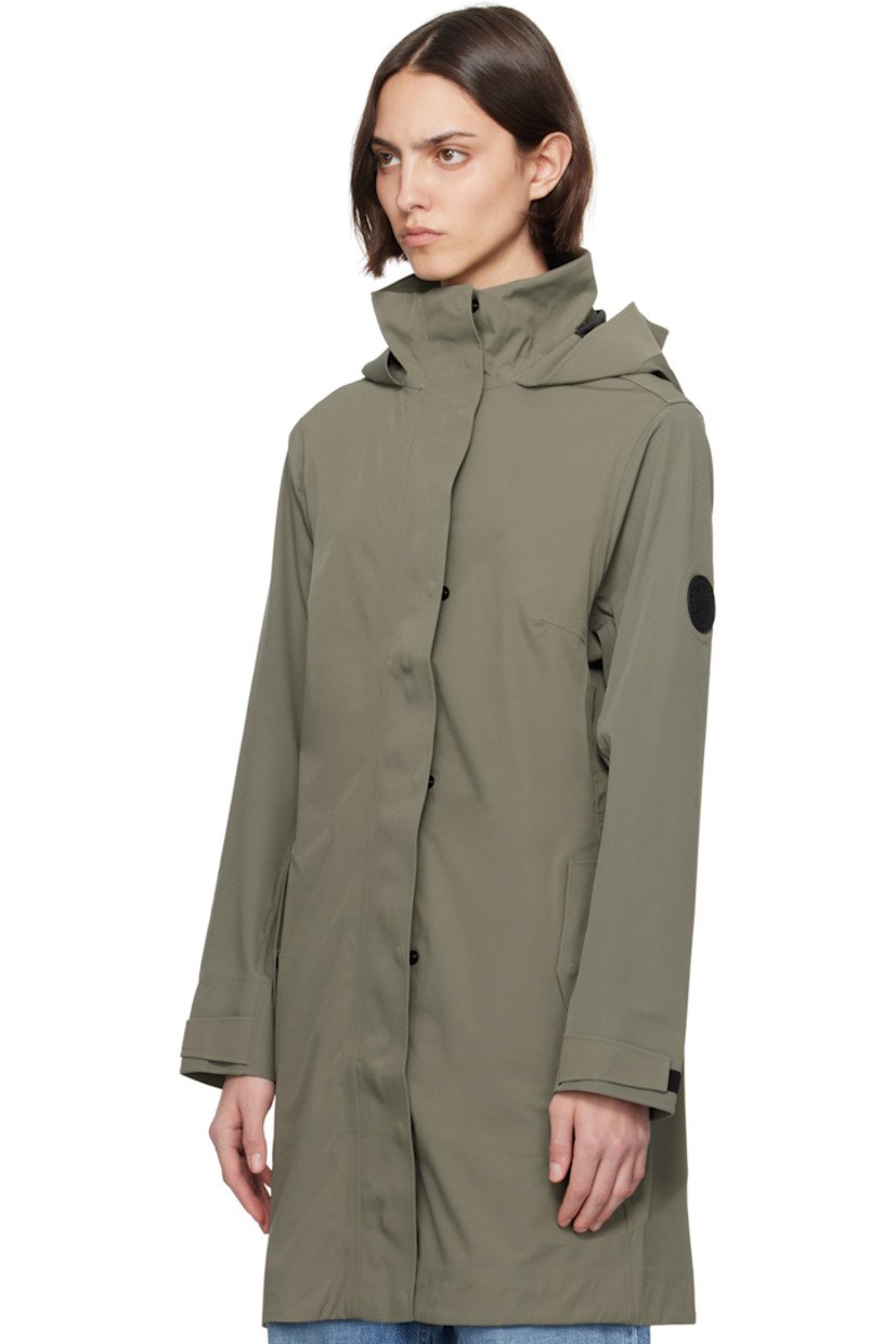 Waterproof stretch nylon taffeta raincoat.

· Bungee-style drawstring and reflective trim at hood
· Stand collar
· Two-way zip closure with press-stud placket
· Flap pockets
· Rubberized logo patch at sleeve
· Velcro tab at cuffs
· Taped seams at interior
· Bungee-style drawstring at interior waist
· Full bonded jersey lining

Part of the Black Label collection.

Supplier color: Smokey sage