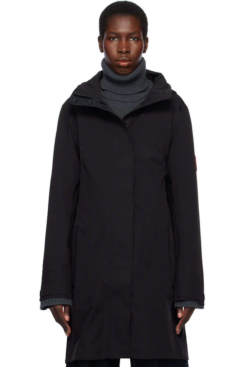 Stretch nylon taffeta rain coat. Lightweight and waterproof.

· Concealed bungee-style drawstring at brimmed hood
· Two-way zip closure with press-stud placket
· Bungee-style drawstring at waist
· Flap pockets
· Rubberized logo patch at sleeve
· Velcro tab at cuffs
· Taped seams at interior
· Full bonded jersey lining

Supplier color: Black