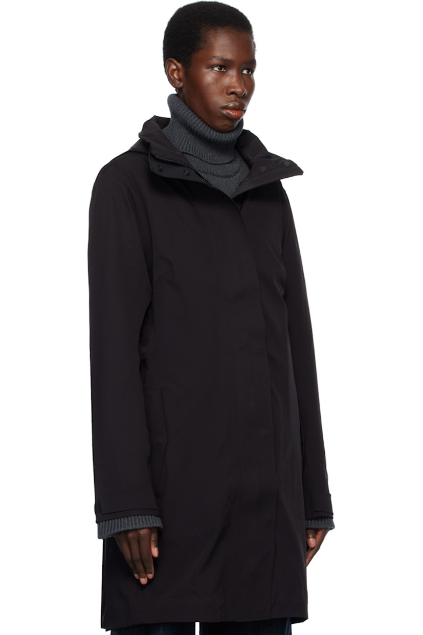 Stretch nylon taffeta rain coat. Lightweight and waterproof.

· Concealed bungee-style drawstring at brimmed hood
· Two-way zip closure with press-stud placket
· Bungee-style drawstring at waist
· Flap pockets
· Rubberized logo patch at sleeve
· Velcro tab at cuffs
· Taped seams at interior
· Full bonded jersey lining

Supplier color: Black