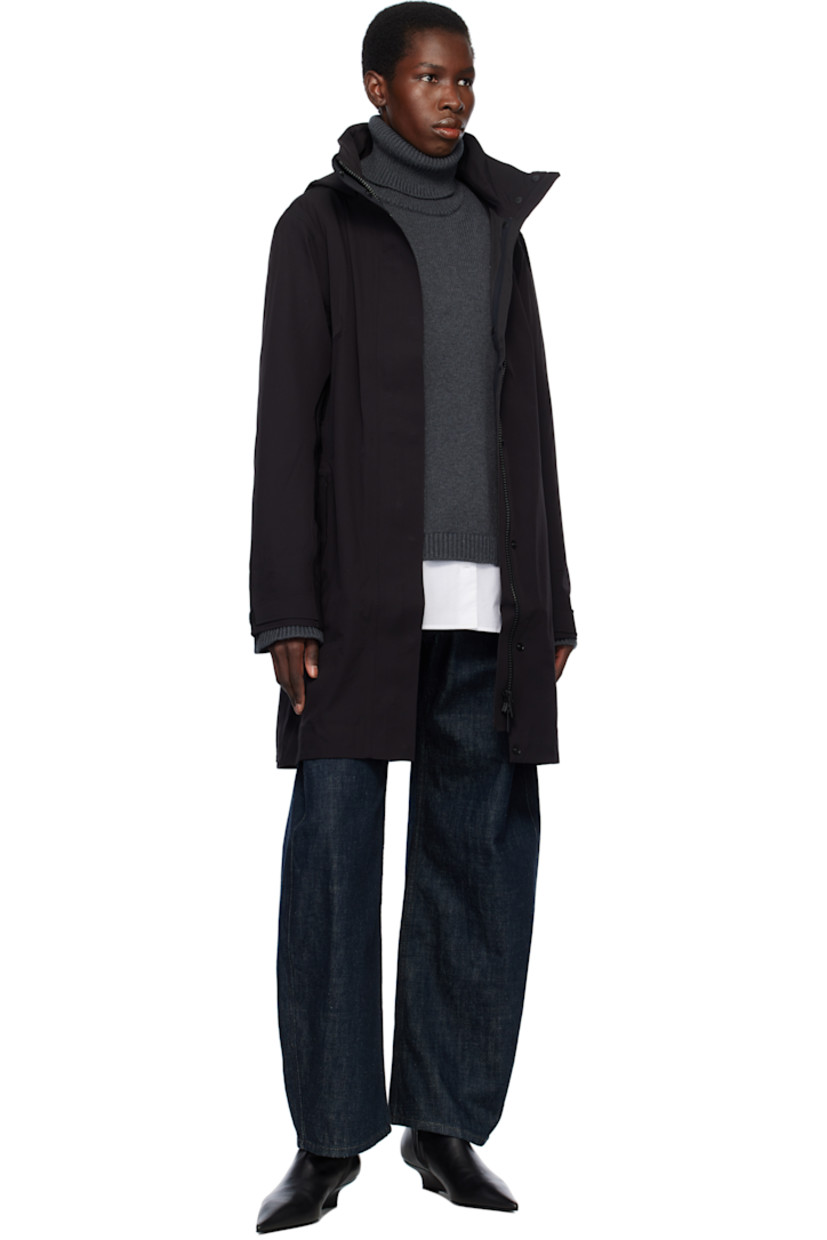 Stretch nylon taffeta rain coat. Lightweight and waterproof.

· Concealed bungee-style drawstring at brimmed hood
· Two-way zip closure with press-stud placket
· Bungee-style drawstring at waist
· Flap pockets
· Rubberized logo patch at sleeve
· Velcro tab at cuffs
· Taped seams at interior
· Full bonded jersey lining

Supplier color: Black