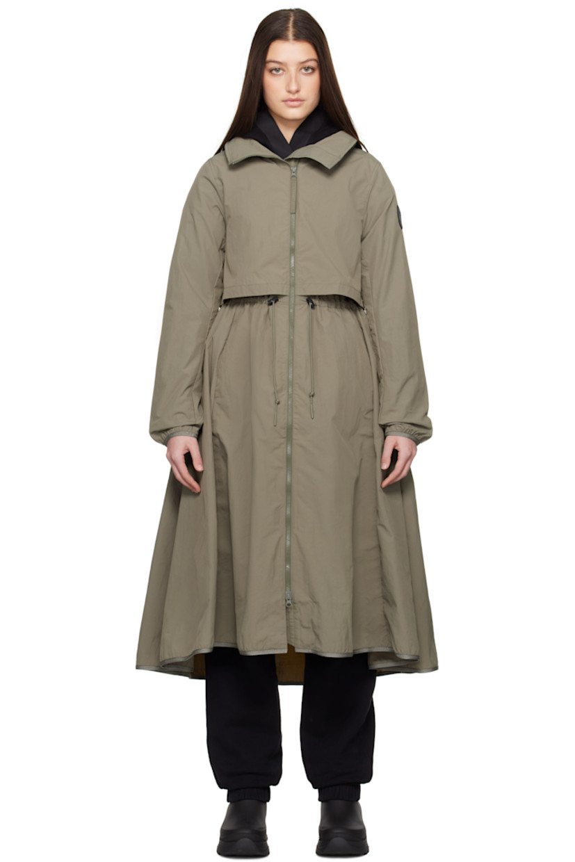 AcclimaLuxe nylon taffeta jacket. Lightweight, wind-resistant, and water-repellent.

· Concealed bungee-style drawstring at stowaway hood
· Two-way zip closure
· Storm flap at front and back
· Zip pockets
· Bungee-style drawstring at waist
· Elasticized trim at hem and cuffs
· Embroidered logo patch at sleeve
· Locker loop at back collar
· Patch pockets at interior
· Partial mesh lining

Part of the Black Label collection.

Supplier color: Smokey sage
