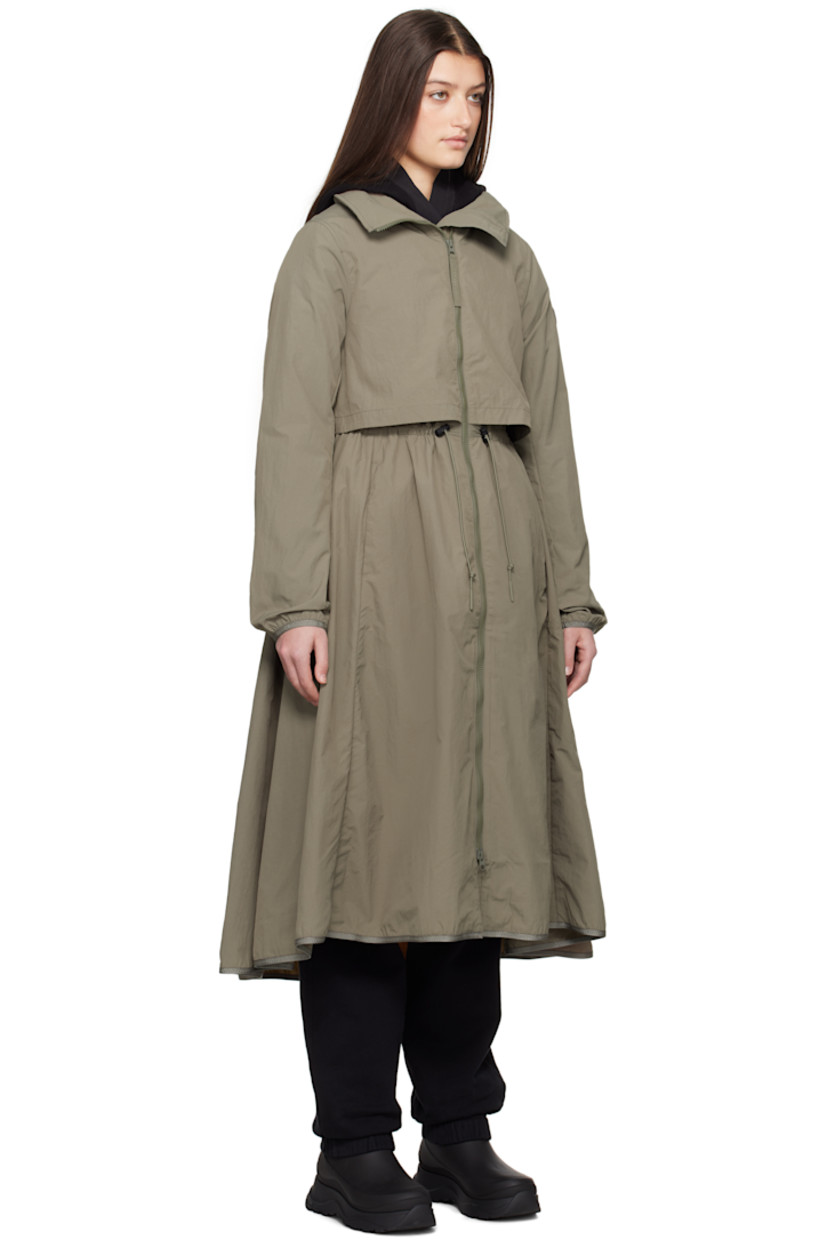 AcclimaLuxe nylon taffeta jacket. Lightweight, wind-resistant, and water-repellent.

· Concealed bungee-style drawstring at stowaway hood
· Two-way zip closure
· Storm flap at front and back
· Zip pockets
· Bungee-style drawstring at waist
· Elasticized trim at hem and cuffs
· Embroidered logo patch at sleeve
· Locker loop at back collar
· Patch pockets at interior
· Partial mesh lining

Part of the Black Label collection.

Supplier color: Smokey sage