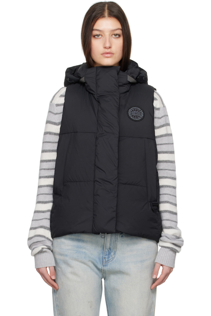 Down-filled and quilted nylon taffeta vest.

· Bungee-style drawstring at detachable hood
· Stand collar
· Two-way zip closure with press-stud placket
· Embroidered logo patch at chest
· Zip pockets
· Bungee-style drawstring at hem
· Patch pocket at interior
· Full satin lining

Part of the Black Label collection.

Supplier color: Black

Fill: 90% duck down, 10% duck feather.