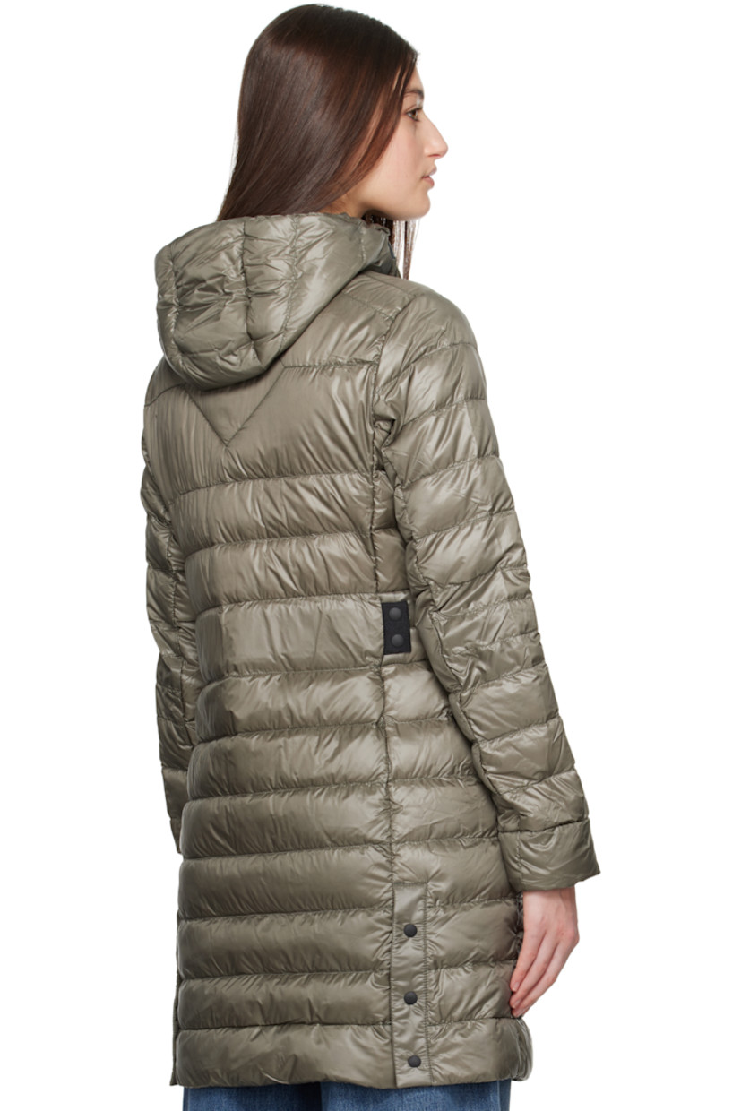 Down-filled and quilted recycled nylon ripstop jacket. Packable, lightweight, water-repellent, and wind-resistant.

· Bungee-style drawstring at hood
· Two-way zip closure
· Zip pockets
· Logo patch at sleeve
· Inset Power Stretch® jersey cuffs
· Reflective trim at back collar
· Integrated adjustable press-stud strap at back waist
· Press-stud vents at back hem
· Patch pockets at interior
· Detachable elasticized shoulder straps at interior
· Fully lined

Part of the Black Label collection.
 
Supplier color: Smokey sage

Fill: 90% duck down, 10% duck feather.