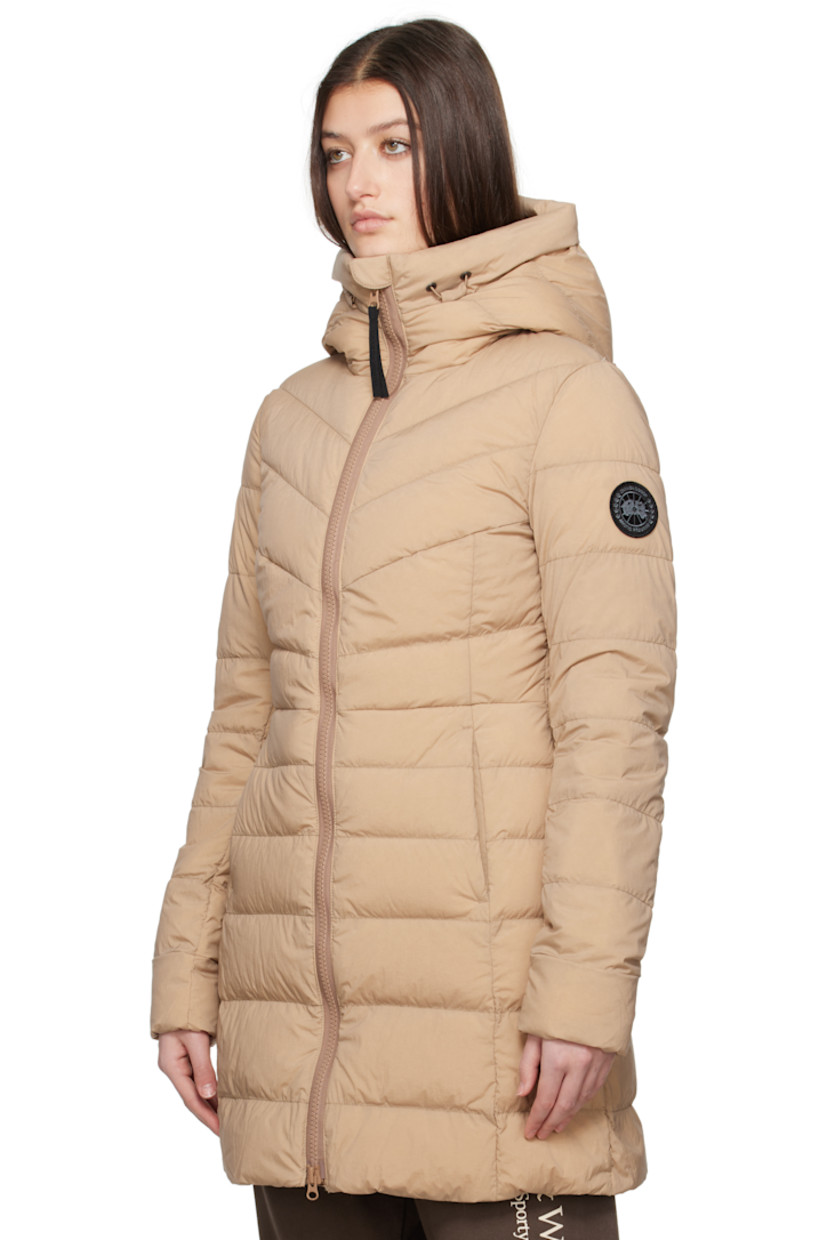 Down-filled and quilted stretch nylon taffeta coat. Lightweight, wind-resistant and water-repellent.

· Bungee-style drawstring at hood
· Funnel neck
· Two-way zip closure
· Zip pockets
· Embroidered logo patch at sleeve
· Logo-woven shoulder straps at interior
· Zip pocket at interior
· Fully lined

Part of the Black Label collection.

Supplier color: Desert sand

Fill: 90% duck down, 10% duck feather.