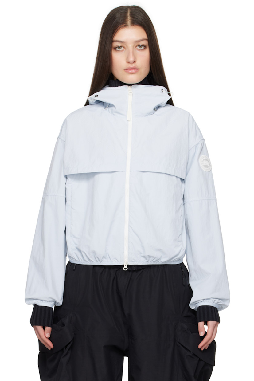 AcclimaLuxe nylon taffeta jacket. Lightweight, durable, water-repellent and wind-resistant.

· Elasticized trim at hood, cropped hem, and cuffs
· Bungee-style drawstring at hood
· Two-way zip closure
· Storm flaps at front and back
· Zip pockets
· Embroidered logo patch at sleeve
· Locker loop at back collar
· Patch pocket at interior
· Partial mesh lining

Supplier color: Early frost