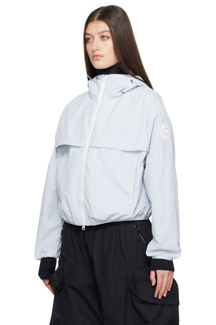 AcclimaLuxe nylon taffeta jacket. Lightweight, durable, water-repellent and wind-resistant.

· Elasticized trim at hood, cropped hem, and cuffs
· Bungee-style drawstring at hood
· Two-way zip closure
· Storm flaps at front and back
· Zip pockets
· Embroidered logo patch at sleeve
· Locker loop at back collar
· Patch pocket at interior
· Partial mesh lining

Supplier color: Early frost