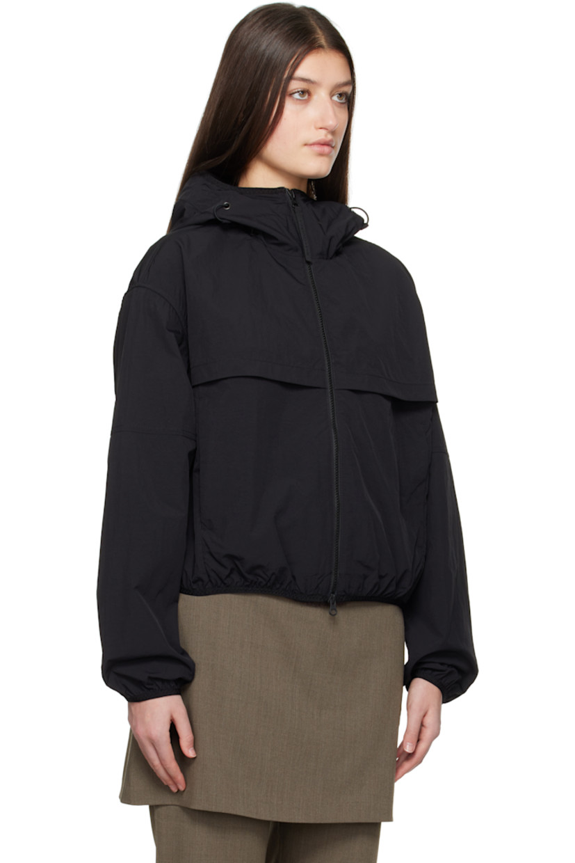 AcclimaLuxe nylon taffeta jacket. Lightweight, durable, water-repellent and wind-resistant.

· Elasticized trim at hood, cropped hem, and cuffs
· Bungee-style drawstring at hood
· Two-way zip closure
· Storm flaps at front and back
· Zip pockets
· Embroidered logo patch at sleeve
· Locker loop at back collar
· Patch pocket at interior
· Partial mesh lining

Part of the Black Label collection.

Supplier color: Black