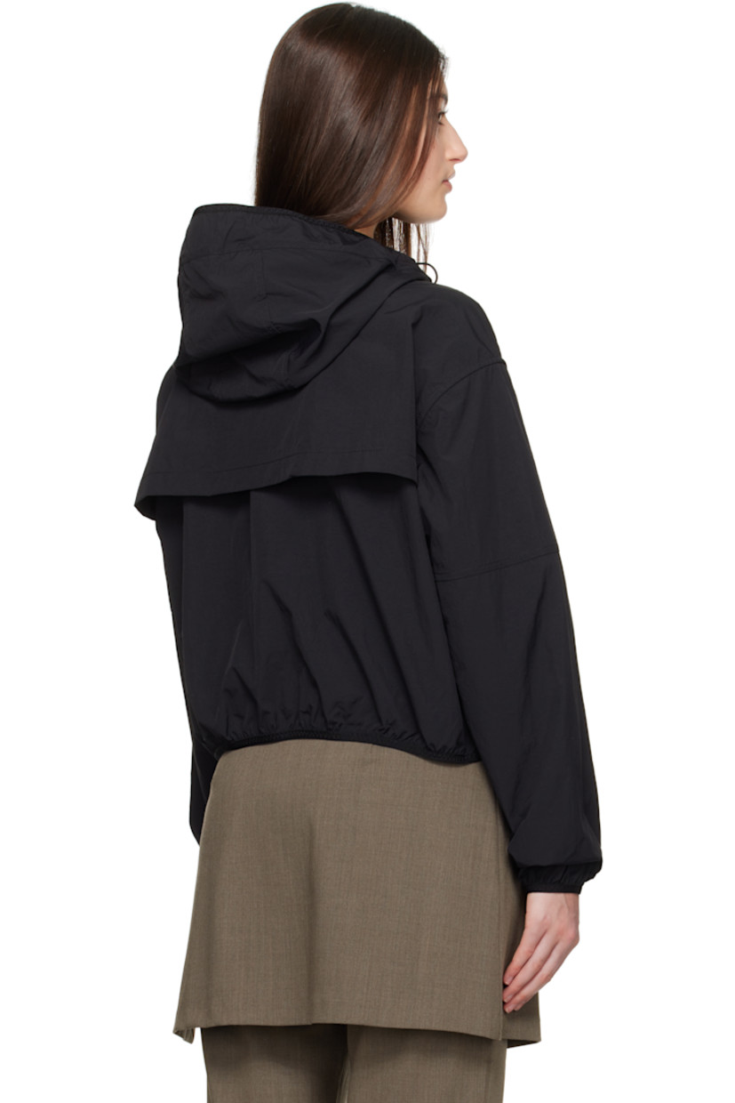 AcclimaLuxe nylon taffeta jacket. Lightweight, durable, water-repellent and wind-resistant.

· Elasticized trim at hood, cropped hem, and cuffs
· Bungee-style drawstring at hood
· Two-way zip closure
· Storm flaps at front and back
· Zip pockets
· Embroidered logo patch at sleeve
· Locker loop at back collar
· Patch pocket at interior
· Partial mesh lining

Part of the Black Label collection.

Supplier color: Black