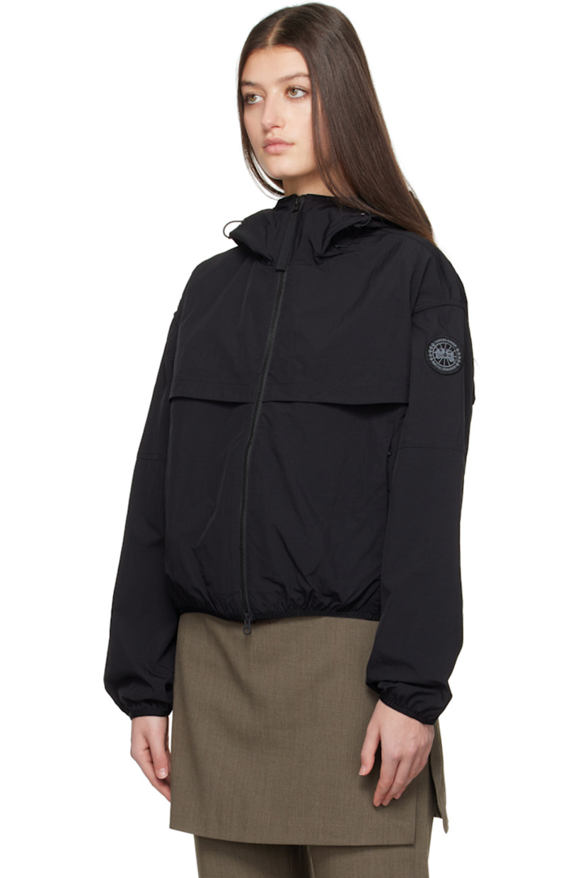 AcclimaLuxe nylon taffeta jacket. Lightweight, durable, water-repellent and wind-resistant.

· Elasticized trim at hood, cropped hem, and cuffs
· Bungee-style drawstring at hood
· Two-way zip closure
· Storm flaps at front and back
· Zip pockets
· Embroidered logo patch at sleeve
· Locker loop at back collar
· Patch pocket at interior
· Partial mesh lining

Part of the Black Label collection.

Supplier color: Black