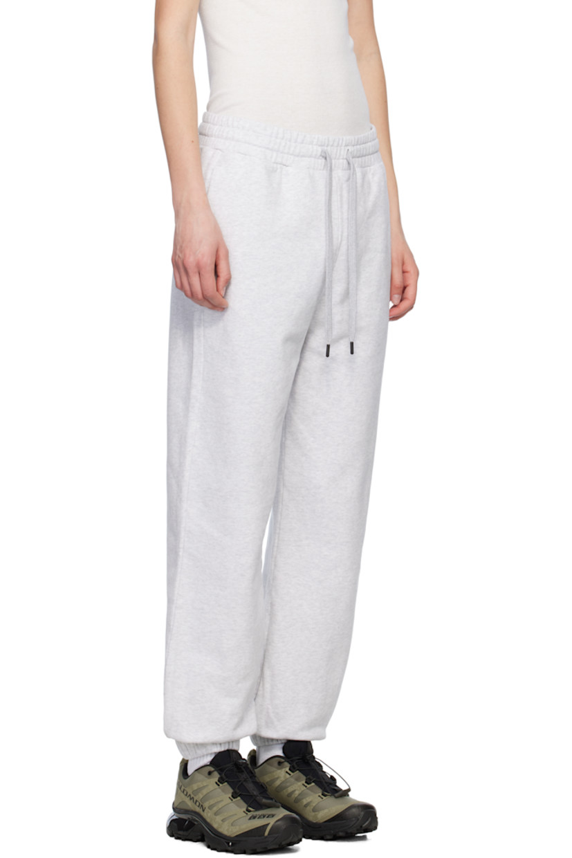 Cotton fleece lounge pants.

· Drawstring at elasticized waistband
· Two-pocket styling
· Logo bonded at front
· Elasticized cuffs

Supplier color: Silverbirch heather