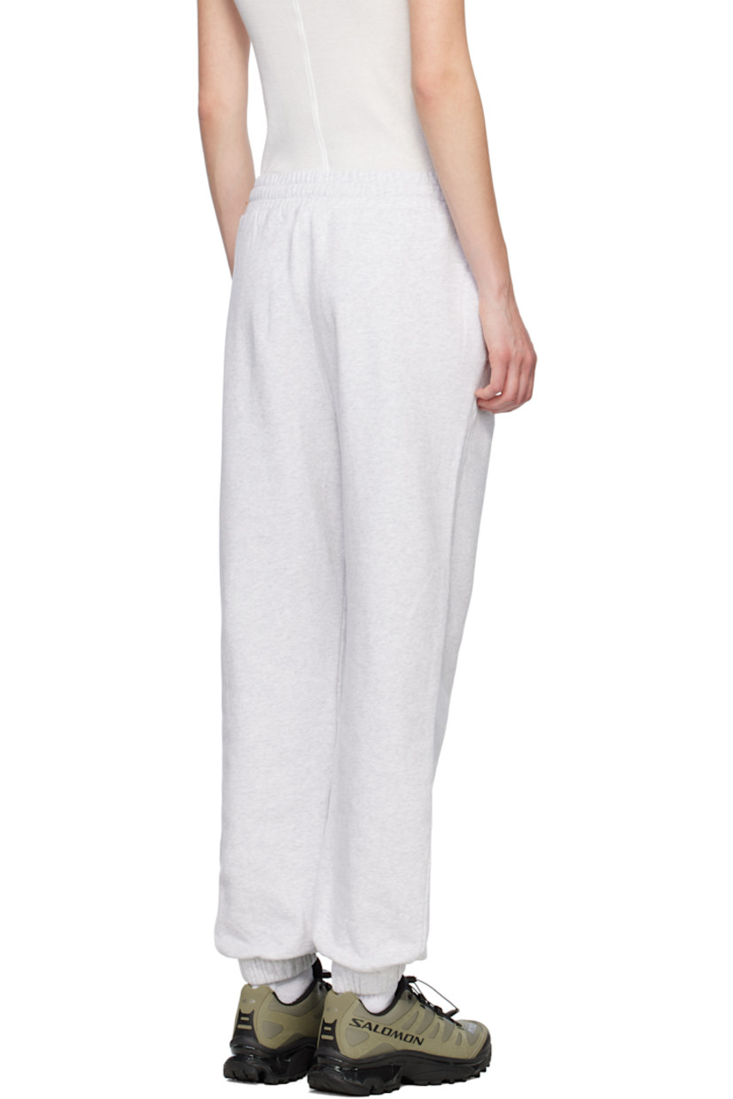 Cotton fleece lounge pants.

· Drawstring at elasticized waistband
· Two-pocket styling
· Logo bonded at front
· Elasticized cuffs

Supplier color: Silverbirch heather