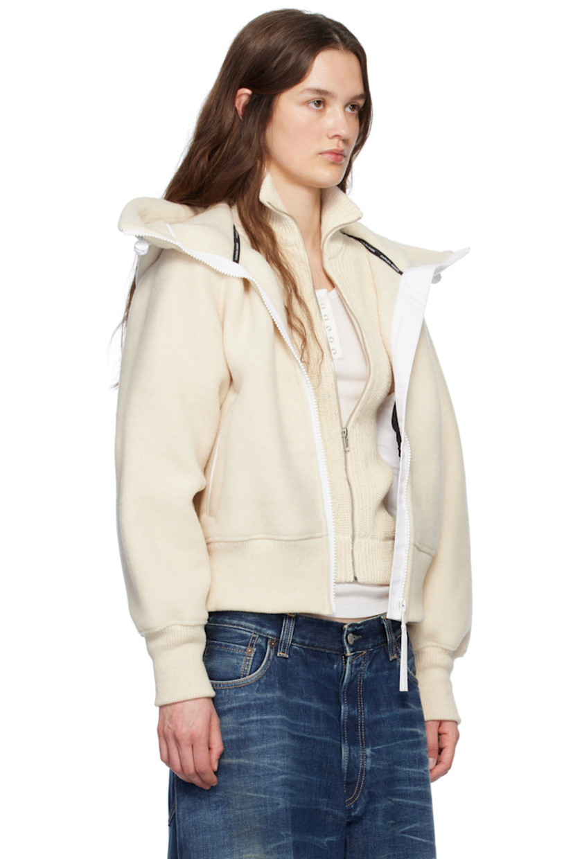 Recycled wool- and TENCEL™ lyocell-blend fleece jacket. 

· Bungee-style drawstring at hood
· Stand collar at hood
· Zip closure
· Welt pockets
· Rib-knit hem and cuffs
· Embroidered logo patch at sleeve
· Topstitching at back
· Unlined

Part of the HUMANATURE capsule collection.

Supplier color: Linen