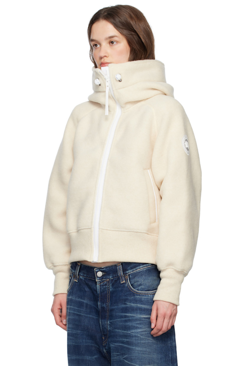 Recycled wool- and TENCEL™ lyocell-blend fleece jacket. 

· Bungee-style drawstring at hood
· Stand collar at hood
· Zip closure
· Welt pockets
· Rib-knit hem and cuffs
· Embroidered logo patch at sleeve
· Topstitching at back
· Unlined

Part of the HUMANATURE capsule collection.

Supplier color: Linen