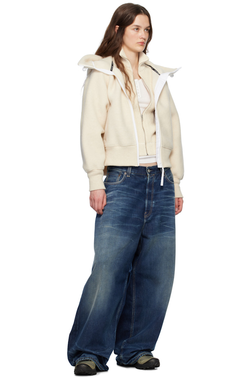 Recycled wool- and TENCEL™ lyocell-blend fleece jacket. 

· Bungee-style drawstring at hood
· Stand collar at hood
· Zip closure
· Welt pockets
· Rib-knit hem and cuffs
· Embroidered logo patch at sleeve
· Topstitching at back
· Unlined

Part of the HUMANATURE capsule collection.

Supplier color: Linen