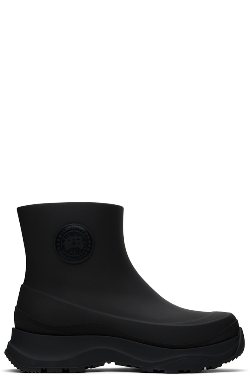 Ankle-high lightweight rubber boots in black.

· Waterproof 
· Logo patch at outer side
· Removable shearling insole
· Moisture-wicking footbed 
· Treaded rubber sole

Supplier color: Black