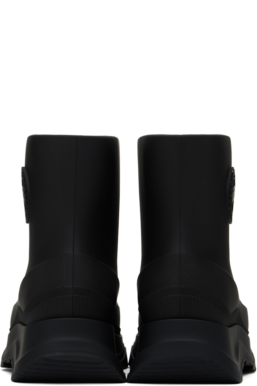 Ankle-high lightweight rubber boots in black.

· Waterproof 
· Logo patch at outer side
· Removable shearling insole
· Moisture-wicking footbed 
· Treaded rubber sole

Supplier color: Black