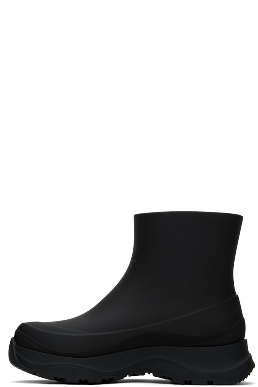 Ankle-high lightweight rubber boots in black.

· Waterproof 
· Logo patch at outer side
· Removable shearling insole
· Moisture-wicking footbed 
· Treaded rubber sole

Supplier color: Black