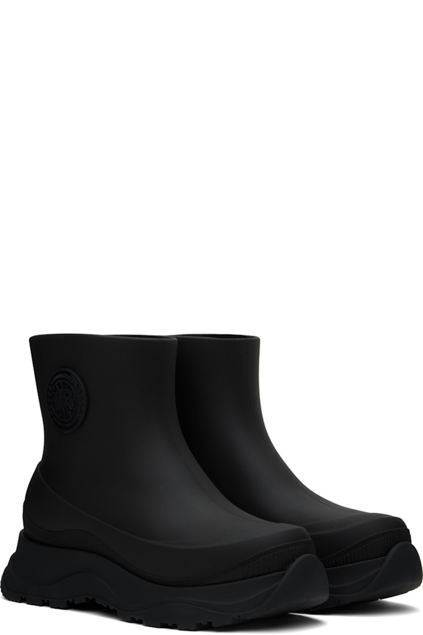 Ankle-high lightweight rubber boots in black.

· Waterproof 
· Logo patch at outer side
· Removable shearling insole
· Moisture-wicking footbed 
· Treaded rubber sole

Supplier color: Black