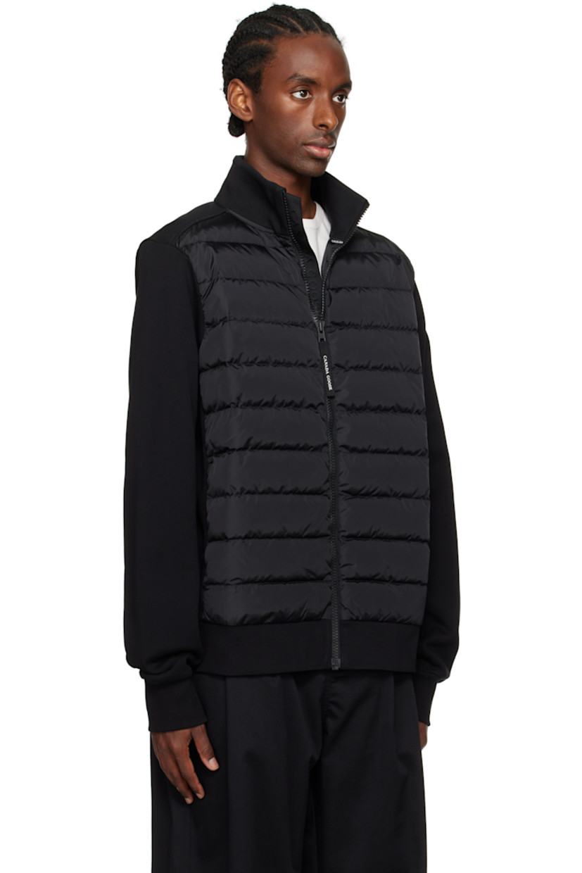 Down-filled and quilted nylon taffeta and French terry jacket. Lightweight.

· RDS-certified down
· Paneled construction
· Rib-knit stand collar, hem, and cuffs
· Logo-bonded zip-pull at zip closure
· Logo-woven trim at placket
· Zip pockets 
· Embroidered logo patch at sleeve
· Partial taffeta lining

Supplier color: Black

Fill: 90% duck down, 10% duck feather.