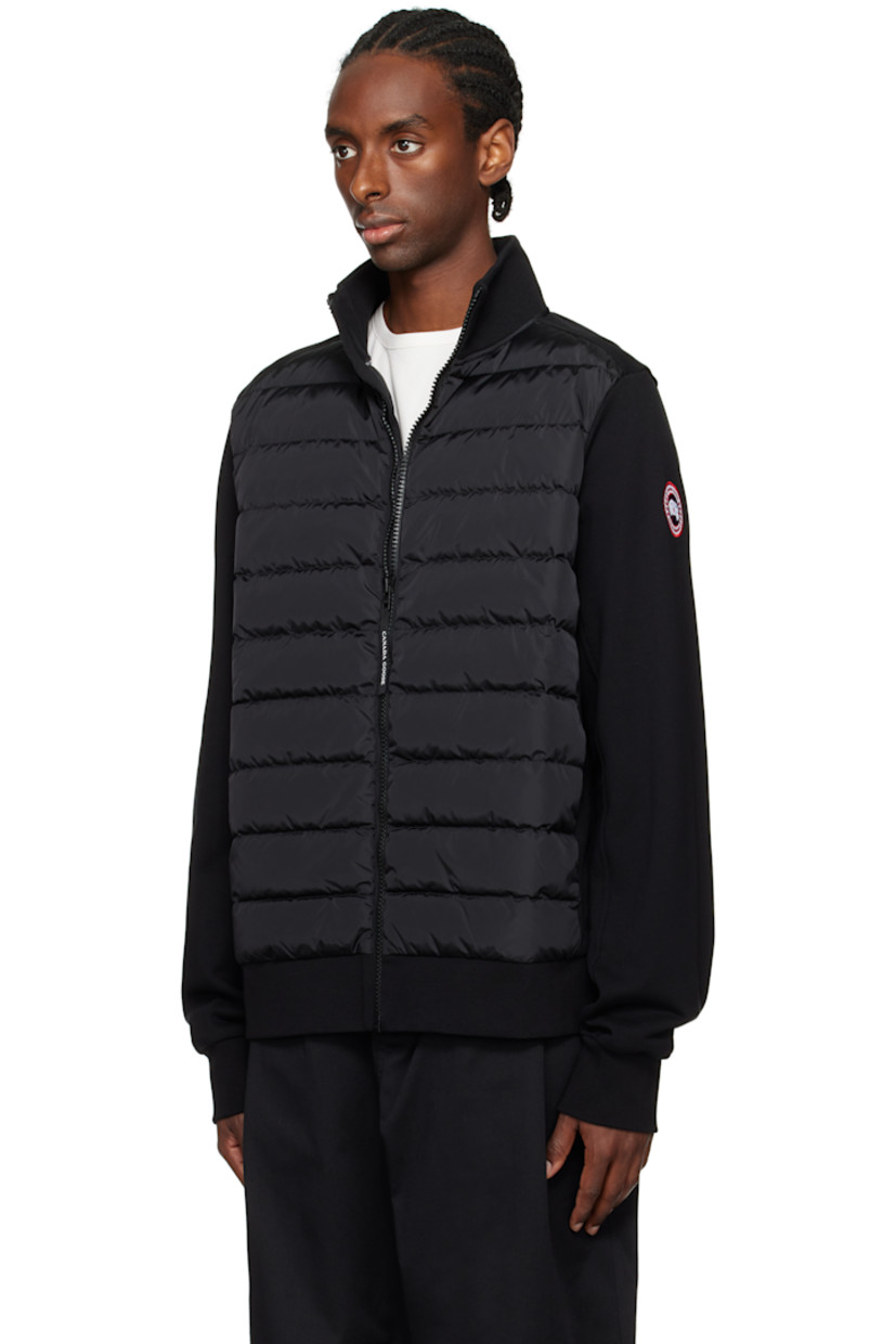 Down-filled and quilted nylon taffeta and French terry jacket. Lightweight.

· RDS-certified down
· Paneled construction
· Rib-knit stand collar, hem, and cuffs
· Logo-bonded zip-pull at zip closure
· Logo-woven trim at placket
· Zip pockets 
· Embroidered logo patch at sleeve
· Partial taffeta lining

Supplier color: Black

Fill: 90% duck down, 10% duck feather.