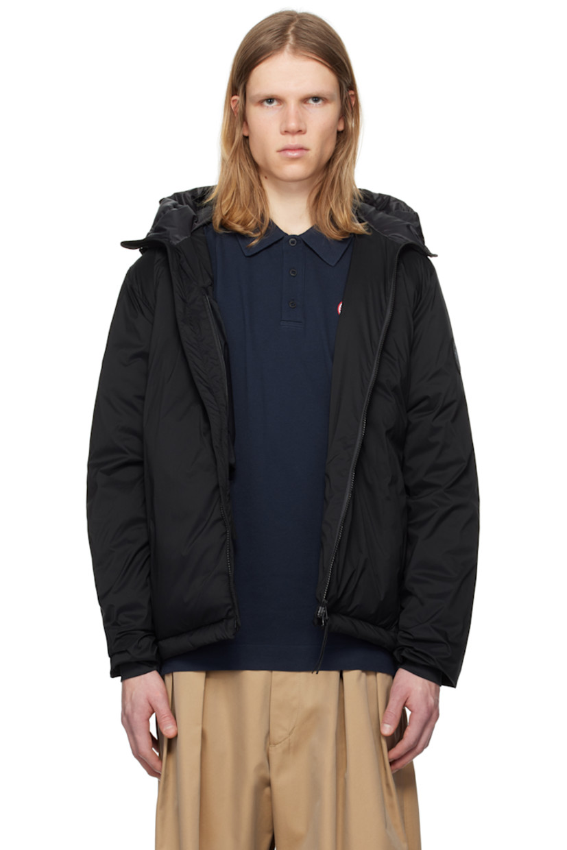 Packable down-filled nylon ripstop jacket. Lightweight, water-repellent, and wind-resistant.

· Bungee-style drawstring at hood
· Stand collar
· Two-way zip closure
· Zip pockets
· Concealed bungee-style drawstring at droptail hem
· Embroidered logo patch at sleeve
· Power Stretch® jersey cuffs
· Zip pocket and patch pocket at interior
· Partial ripstop and quilted satin lining

Part of the Black Label collection.

Supplier color: Black

Fill: 90% duck down, 10% duck feathers.