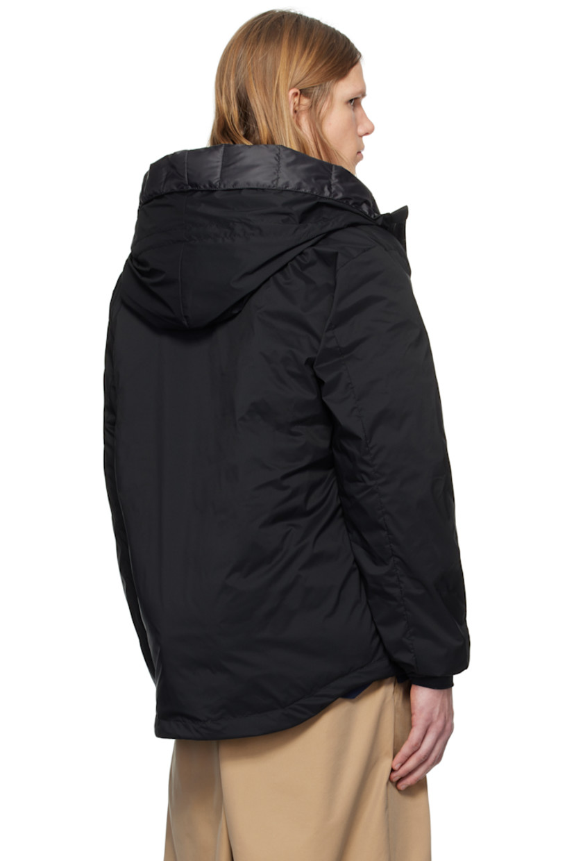 Packable down-filled nylon ripstop jacket. Lightweight, water-repellent, and wind-resistant.

· Bungee-style drawstring at hood
· Stand collar
· Two-way zip closure
· Zip pockets
· Concealed bungee-style drawstring at droptail hem
· Embroidered logo patch at sleeve
· Power Stretch® jersey cuffs
· Zip pocket and patch pocket at interior
· Partial ripstop and quilted satin lining

Part of the Black Label collection.

Supplier color: Black

Fill: 90% duck down, 10% duck feathers.