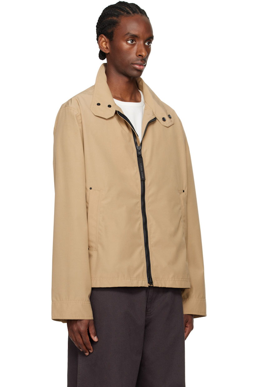 Arctic Tech® recycled polyester- and organic cotton-blend faille jacket. Lightweight and water-repellent.

· Press-stud fastening at funnel neck
· Logo-woven zip-pull at two-way zip closure
· Zip pockets
· Embroidered logo patch at sleeve
· Gusset and adjustable press-stud tab at cuffs
· Reflective trim at back collar
· Zip pocket at interior
· Full satin lining
· Logo-engraved black hardware

Part of the Black Label collection.

Supplier color: Desert sand