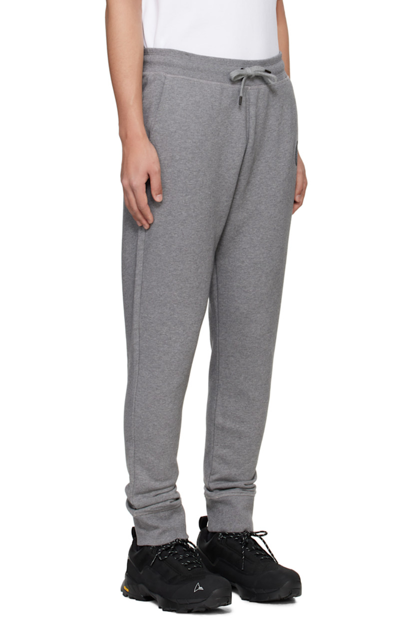 French terry sweatpants.

· Drawstring at elasticized waistband
· Rib-knit waistband and cuffs
· Three-pocket styling
· Embroidered logo patch at front

Part of the Black Label collection.

Supplier color: Stone heather