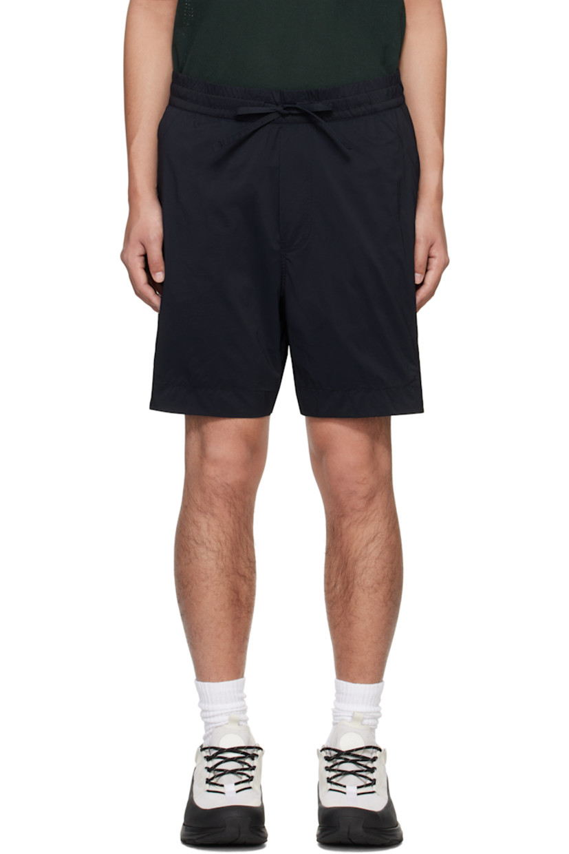 Packable nylon ripstop shorts.

· Drawstring at elasticized waistband
· Three-pocket styling
· Mock fly
· Vented outseams
· Embroidered logo patch at back
· Packs into back zip pocket
· Full nylon taffeta lining

Supplier color: Black