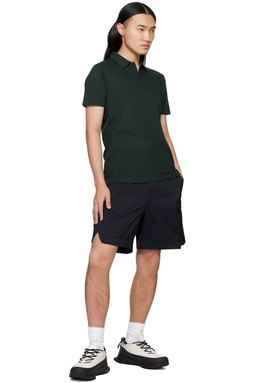 Packable nylon ripstop shorts.

· Drawstring at elasticized waistband
· Three-pocket styling
· Mock fly
· Vented outseams
· Embroidered logo patch at back
· Packs into back zip pocket
· Full nylon taffeta lining

Supplier color: Black