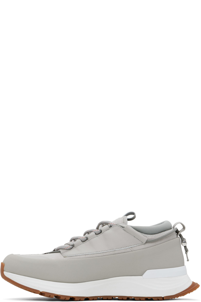 Low-top buffed leather and nubuck sneakers in gray.

· Waterproof
· Lace-up closure 
· Cord-lock ankle drawstring
· Logo patch at tongue
· Padded sock-style collar
· Logo embossed at outer side
· Perforated detailing 
· Pull-loop at heel collar 
· HDry® jersey lining
· Microfibre onSteam® footbed
· Rubberized trim at welt 
· Heel stabilizer at foam rubber midsole
· Treaded rubber sole

Supplier color: Limestone/White